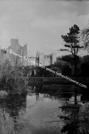 HOWTH CASTLE  LUTYEN'S TOWER (1911) AND STABLES FROM POND